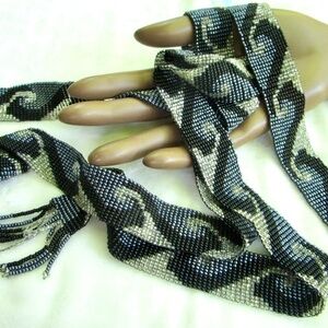 vintage 56-inch necklace or belt, beaded in blue, white, black wave pattern